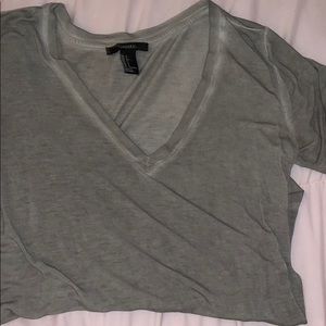 green v-neck shirt